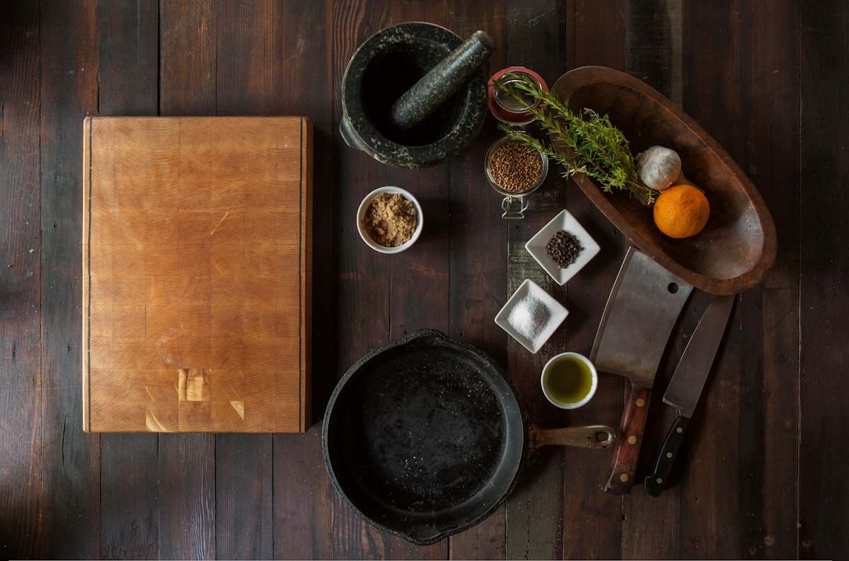 Student preparing vegetables with learned techniques